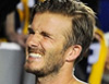 David Beckham Dipeluk Fans Wanita Usai Bertanding