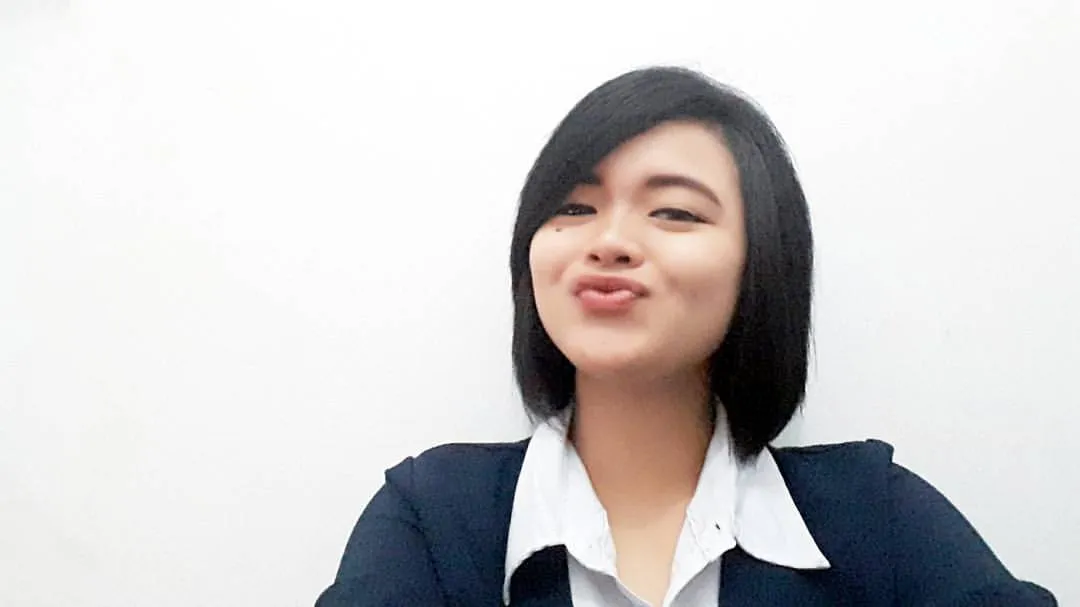 Bripda Tenia Puspitaningtyas, anggota Polwan yang turut serta menjadi relawan dalam aksi #NebengMalang © Facebook.com/Tenia Puspaningtyas