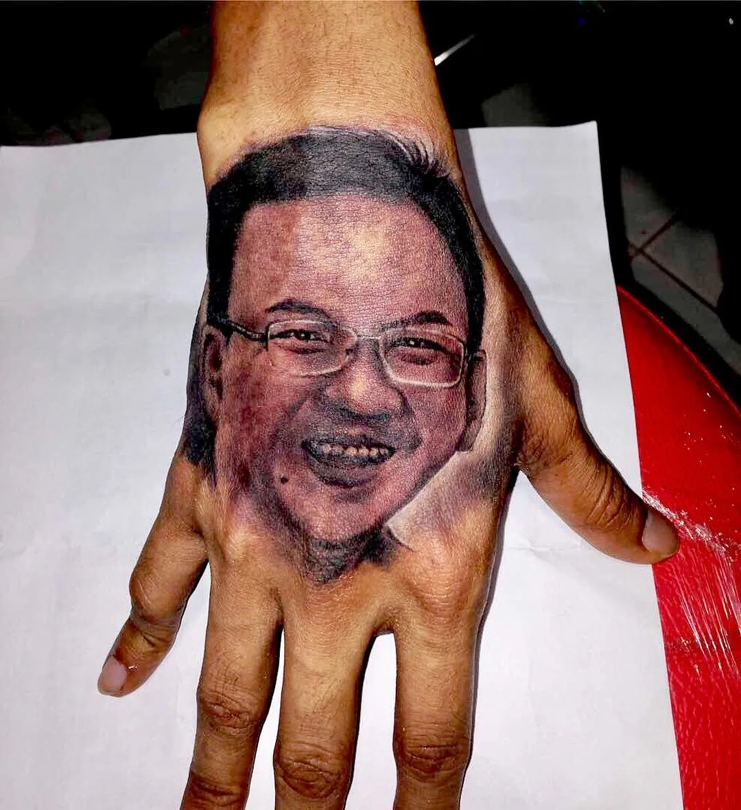 Young Lex tato wajah Ahok di tangannya secara permanen © Intagram/young_lex18