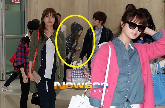 Taeyeon berlari menghindari kerumunan wartawan