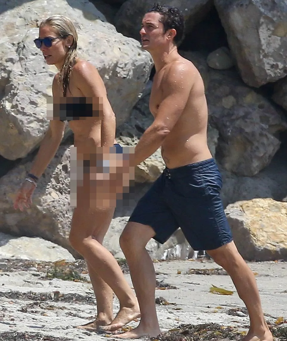 Orlando ketahuan ke pantai bareng seorang wanita cantik © via dialymail.co.uk