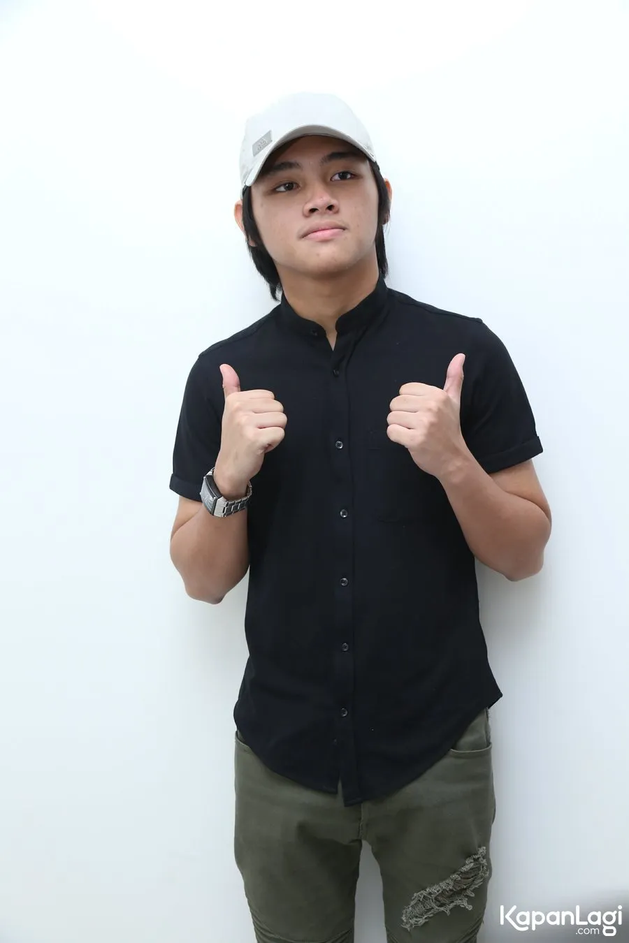 Aldi berikan dukungan untuk Timnas melawan Thailand. Cr KapanLagi.com/Agus Apriyanto