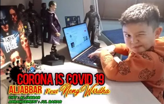 Al Jabbar ciptakan lagu Corona Is Covid 19 yang dibawakan bersama sang ibu © Youtube/aljabbar official