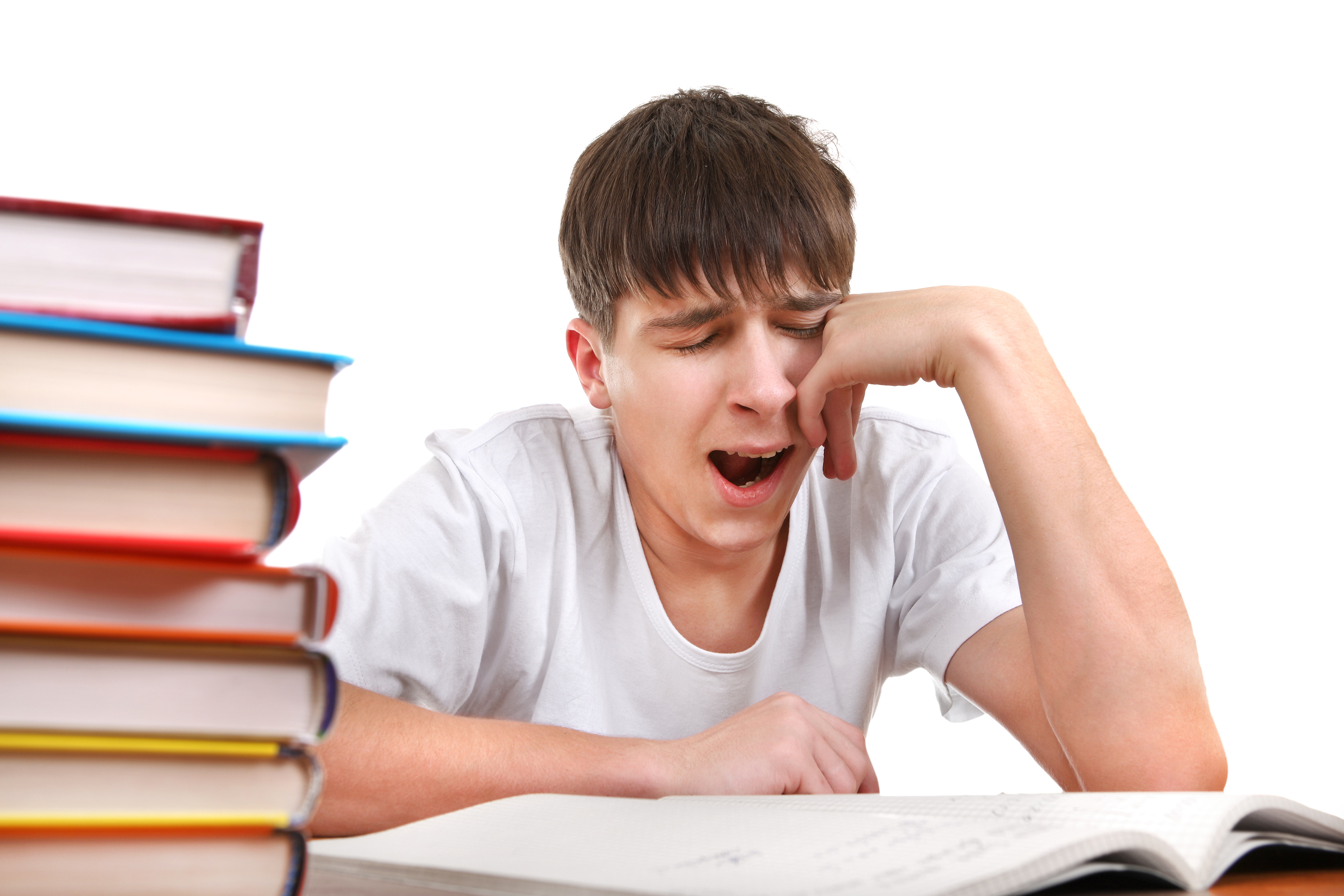 Почему при чтении зеваешь. Уставший студент. Уставший подросток. Студент зевает. Подросток зевает.
