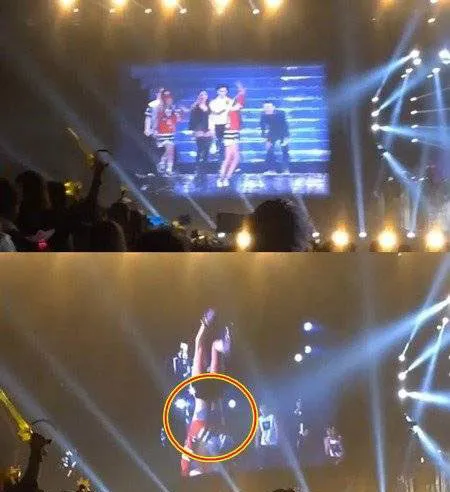 Bom 2NE1 alami wardrobe malfunction saat tampil di konser YG FAMILY Shanghai, Minggu (19/10) @allkpop.com