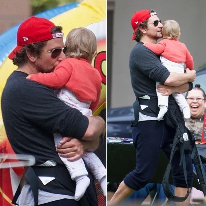 Bradley gagah dan ganteng saat gendong anak © BACKGRID via dailymail.co.uk