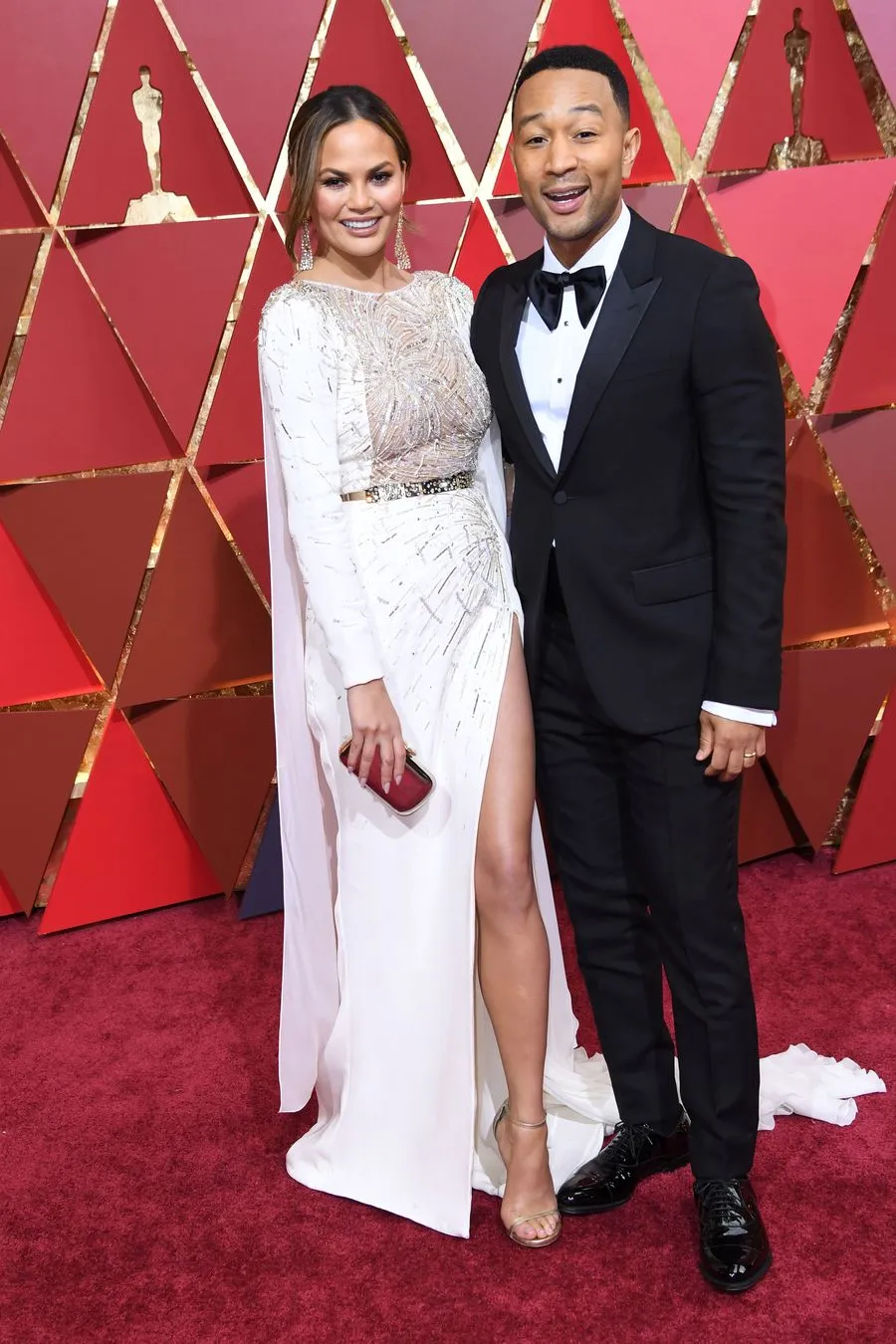 John dan Chrissy di atas red carpet Oscar © AFP