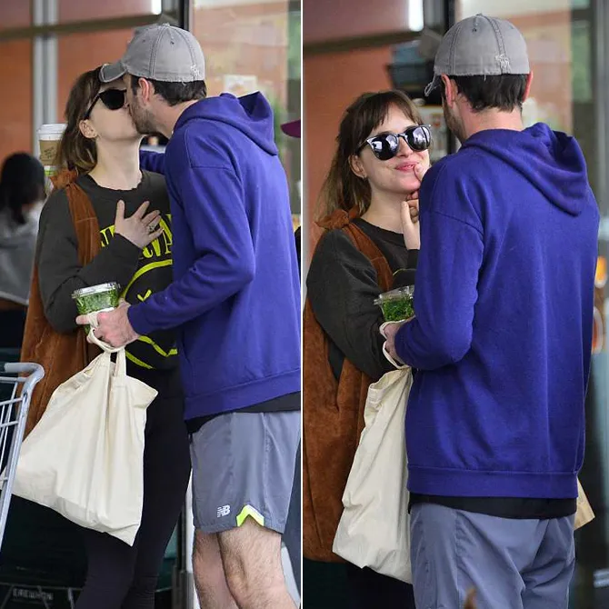 Dakota tertangkap ciuman di belakang Chris Martin © The Image Direct via dailymail.co.uk