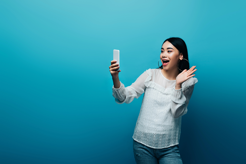 Illustration of a woman looking at a smartphone. (c) HayDmitriy/Depositphotos.com