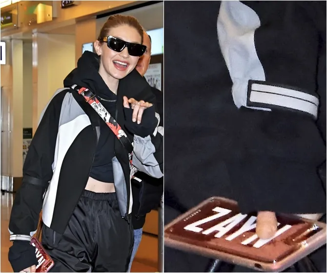 Gigi Hadid pakai casing HP bertuliskan nama Zayn. Credit: Just Jared