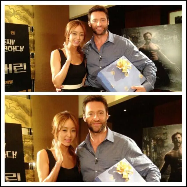 G.NA tengah berpose dengan Hugh Jackman. ©allkpop.com