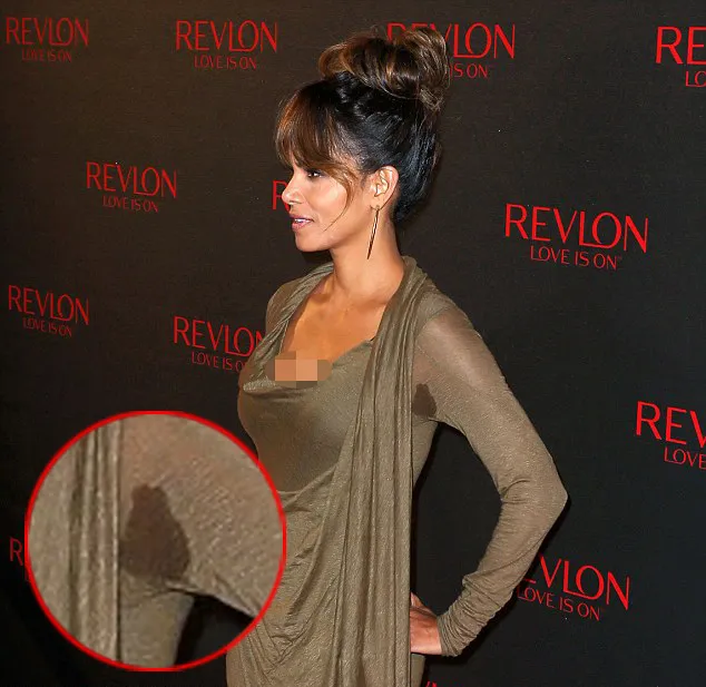 Halle 'pamer' ketiak basah di atas red carpet © Splashnews.com