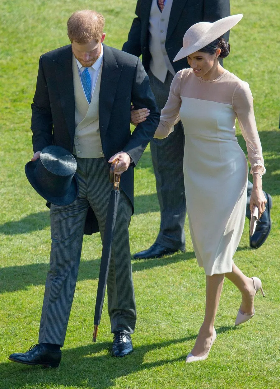 Harry dan Meghan tetap gandengan sama seperti sebelum menikah © AFP