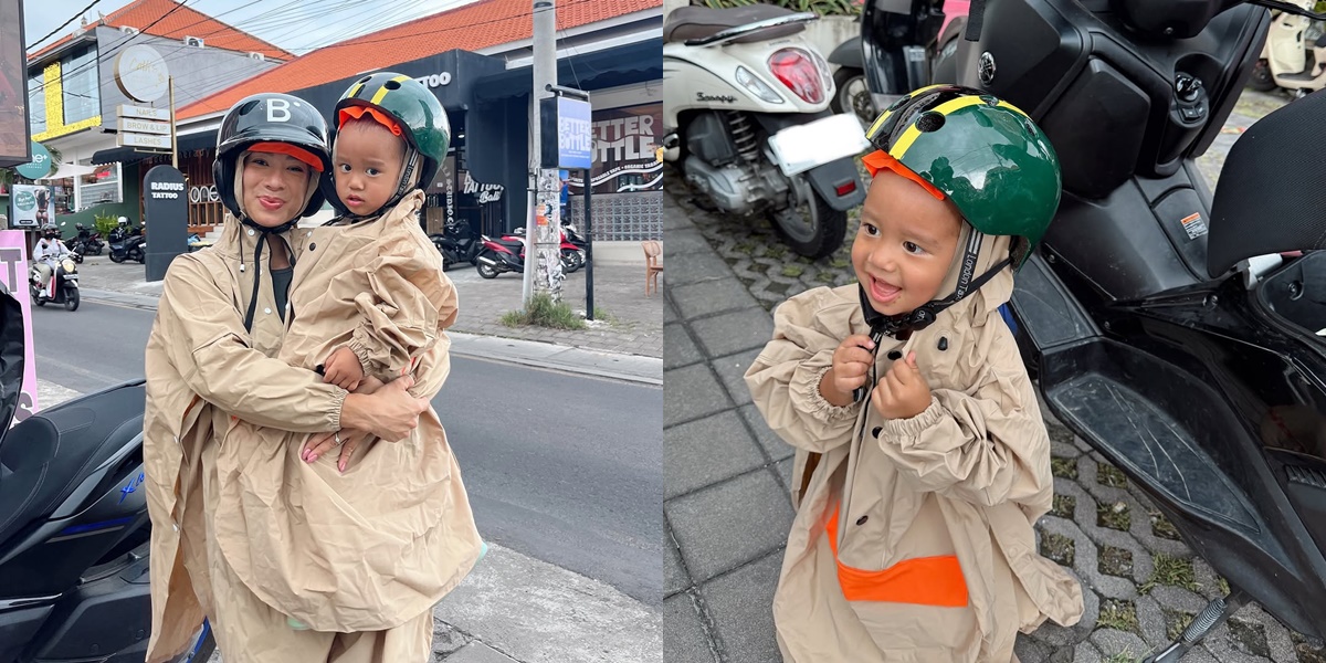 6 Portraits of Jennifer Bachdim's Youngest Child in Oversized Raincoat, So Adorable