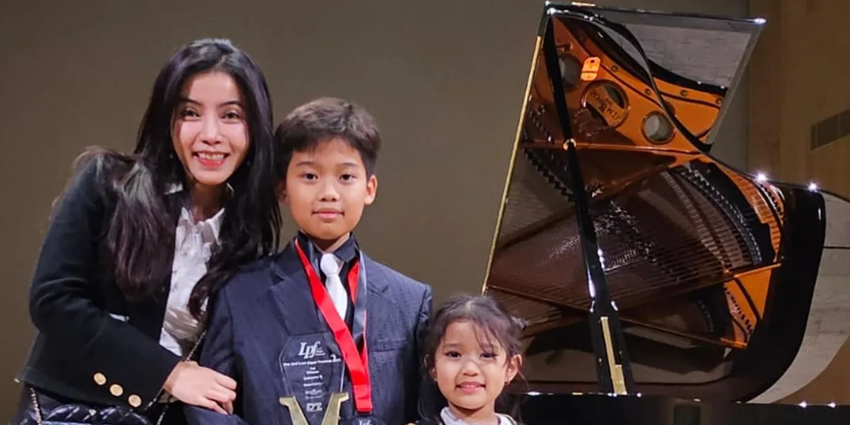 Angela Prisa's child, Ken Ademaro, wins 1st place in the piano competition and receives a scholarship to Korea