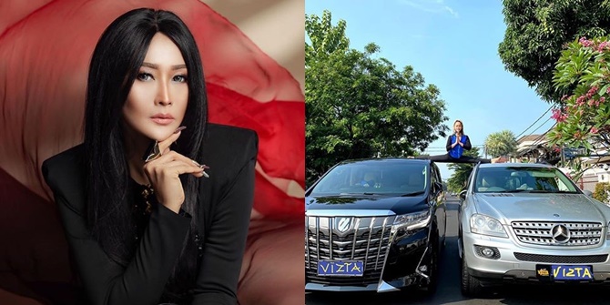 Showing off her luxurious car, Inul Daratista strikes a perfect split pose between the roofs of two parked cars