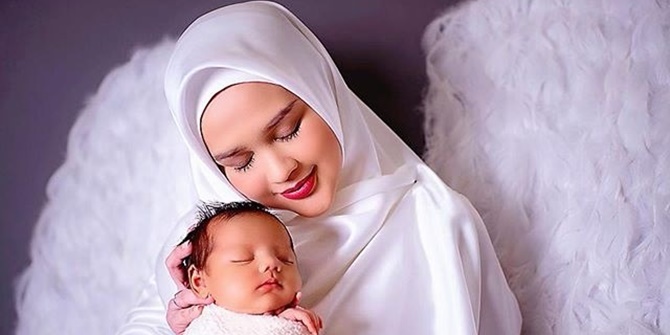 Mother and Child Photoshoot, Cut Meyriska Looks Like an Angel Carrying Baby Shaquille