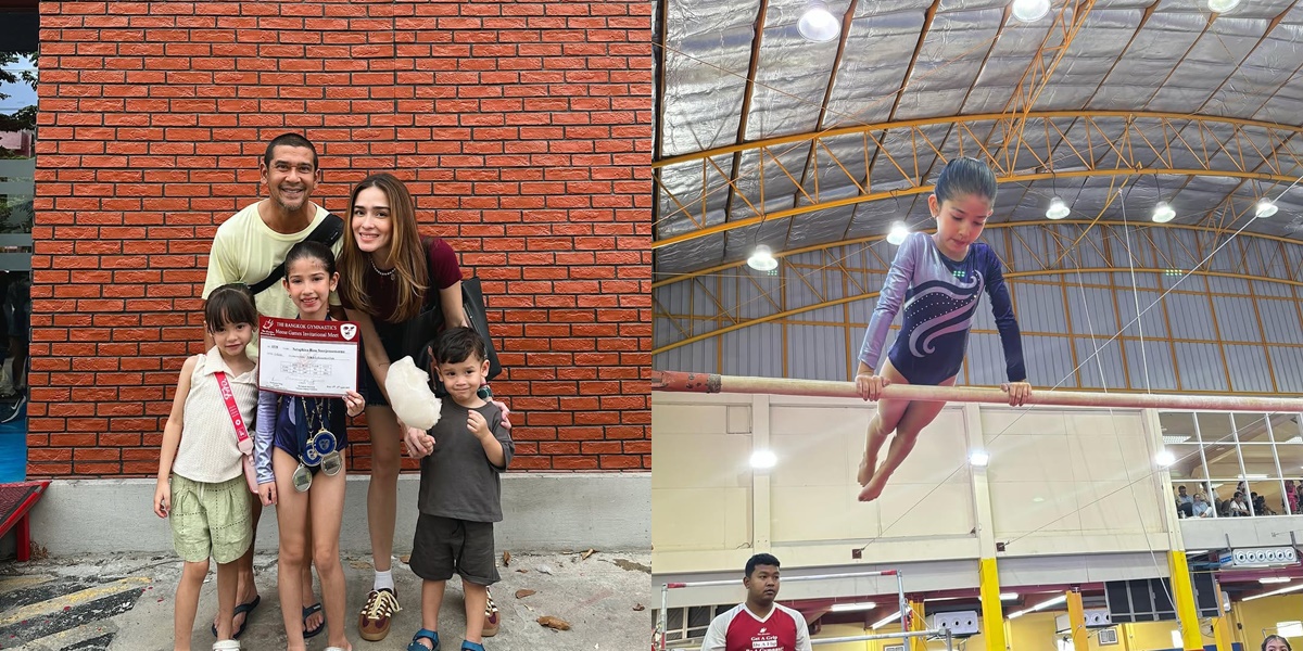 Portrait of Yasmine Wildblood's Child Winning Gold Medal at Gymnastics Competition in Bangkok