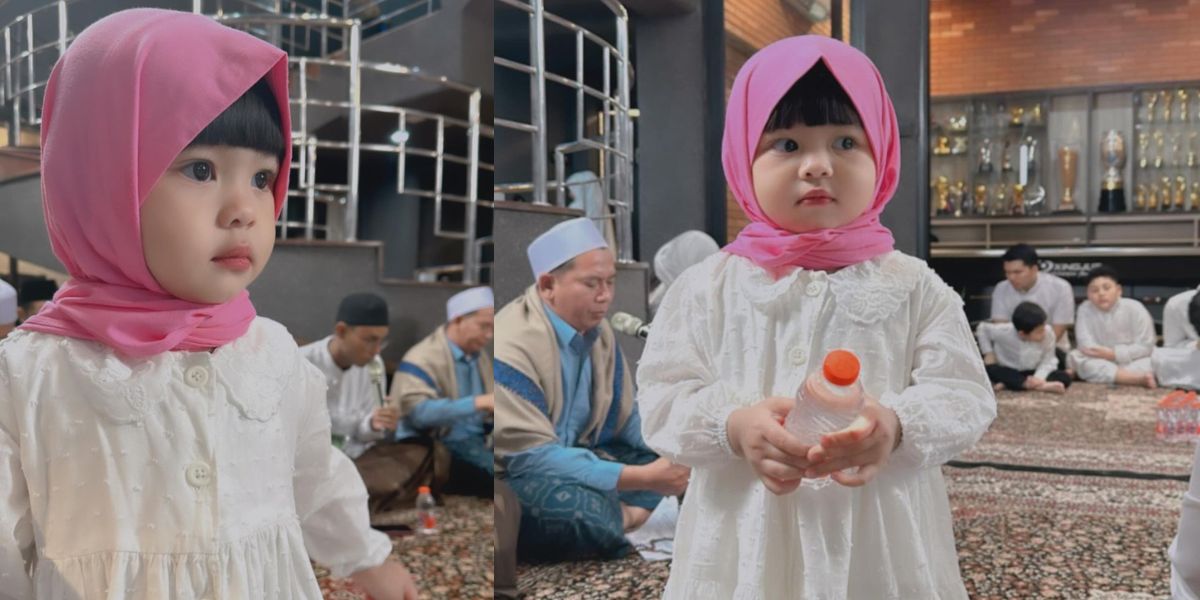 Portrait of Cute Ameena, Daughter of Aurelie Hermansyah and Atta Halilintar, Wearing Pink Hijab with Bangs, Said to Resemble Marsha