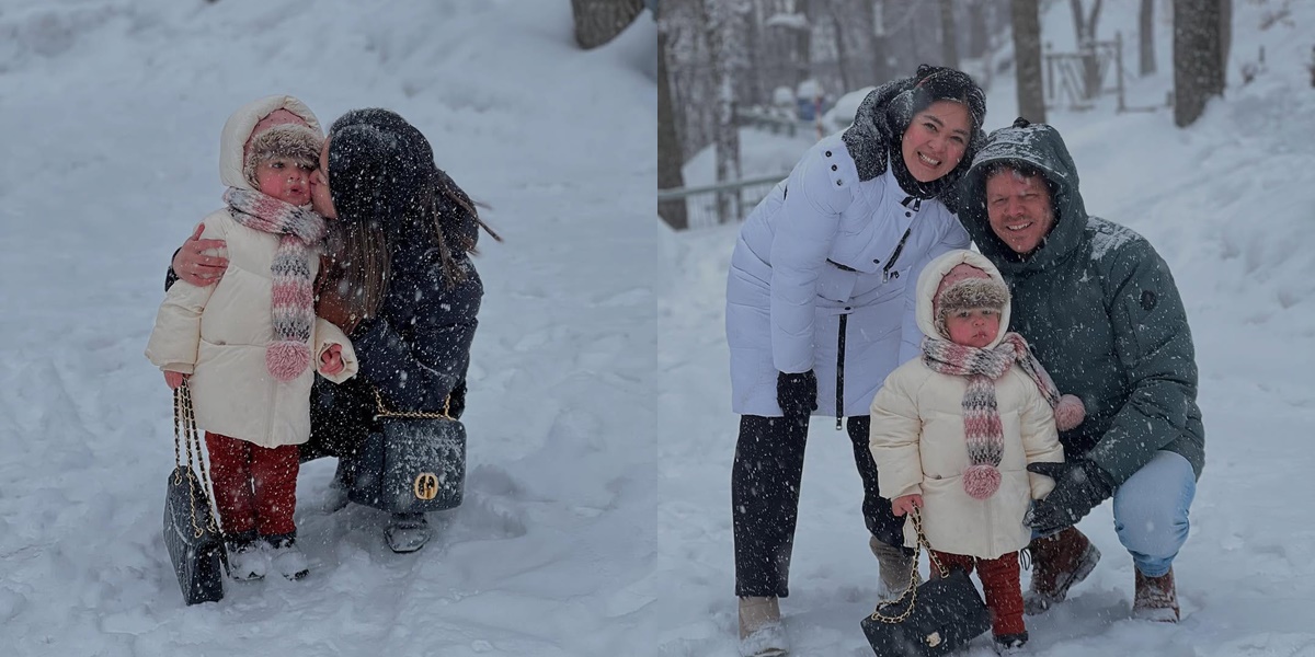 Portrait of Gracia Indri and Gisela Cindy Playing in the Snow in Quebec City