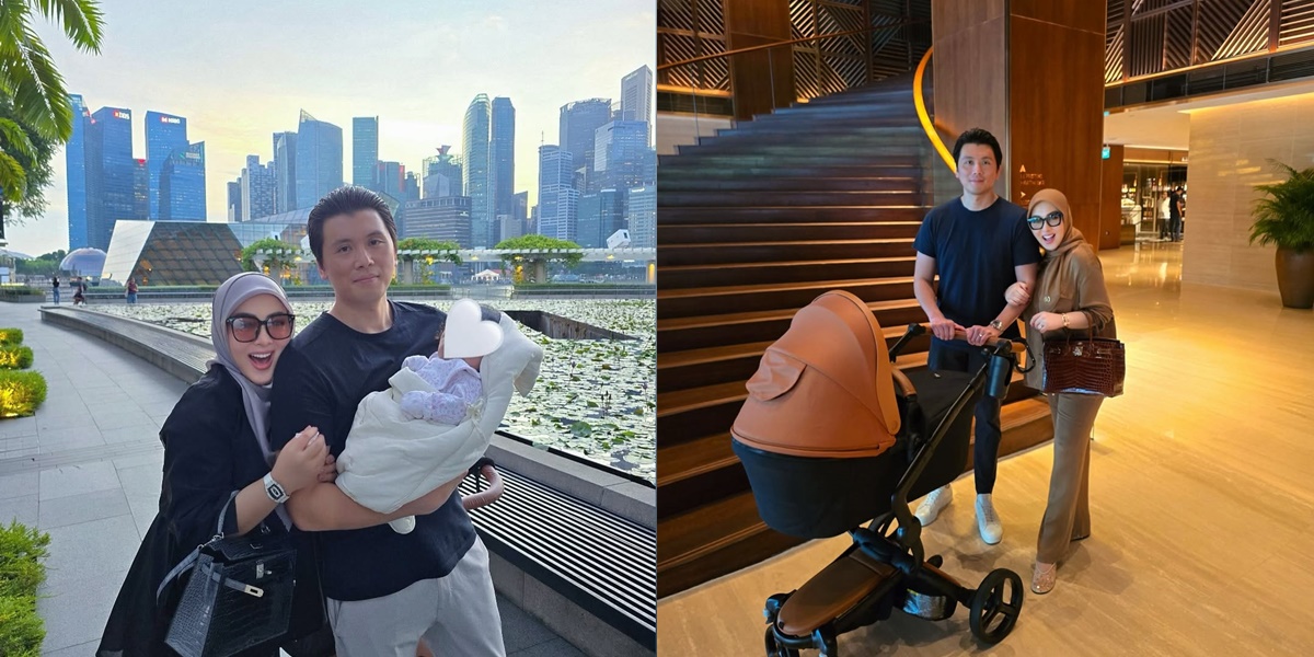 Candid Portrait of Syahrini and Reyno Barack Caring for Their Child in Singapore