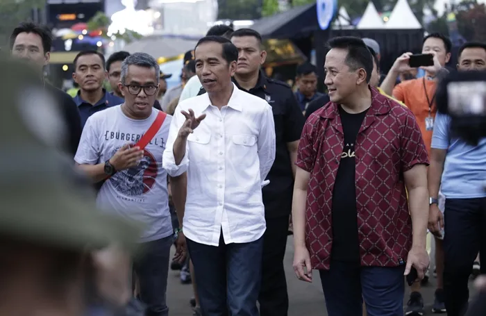 Didampingi Triawan Munaf, Jokowi menghadiri WTF 2018. (KapanLagi.com/Agus Apriyanto)