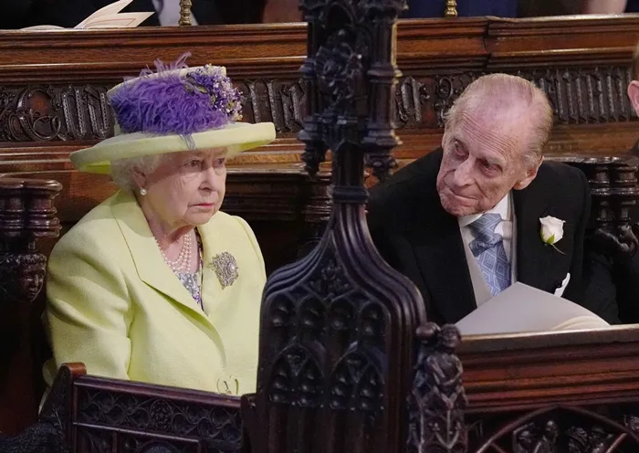 Pangeran Philip menghadiri pernikahan Meghan-Harry bersama Ratu Elizabeth II. (AFP)