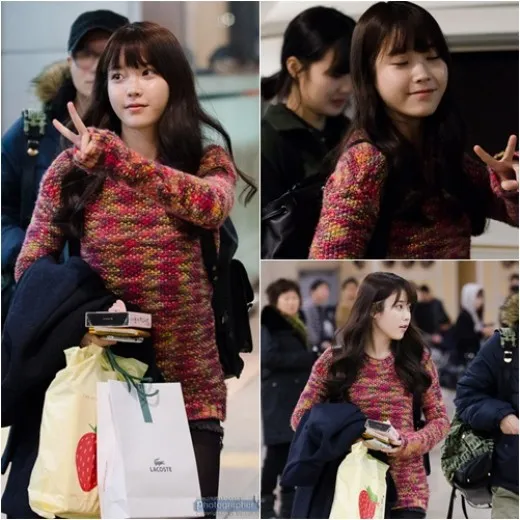 Foto IU tanpa make up di bandara ©Allkpop.com