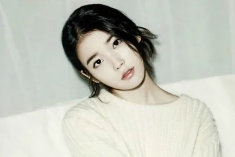 IU akan menyanyikan lagu di pernikahan manajernya. ©soompi.com