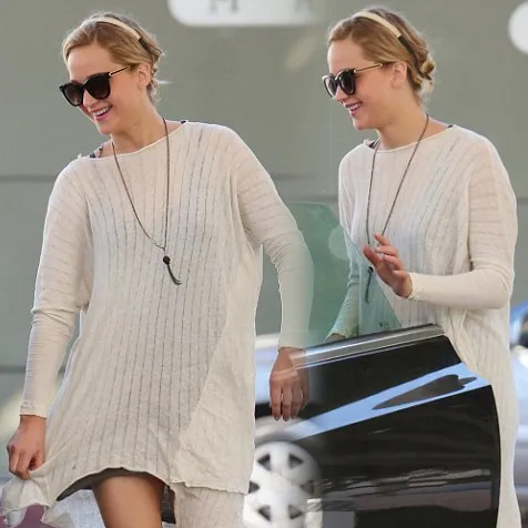 Ekspresi bahagia J-Law setelah putus cinta @ dailymail.co.uk