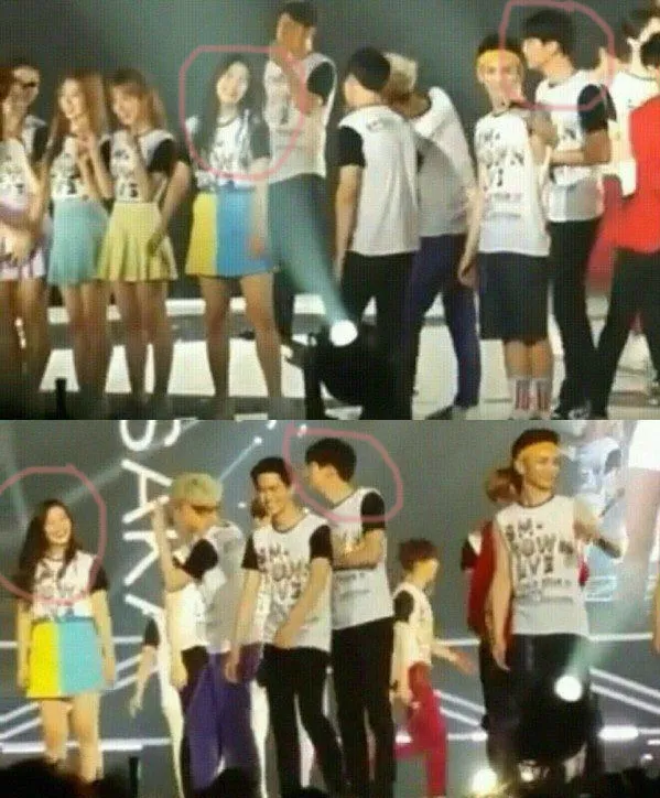 Joy yang tampak digoda oleh Heechul dan Suho. Dari sisi lain Chanyeol terlihat memandang dari sisi lain. ©soompi.com