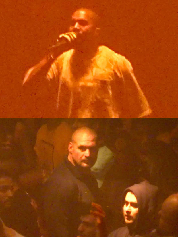 Kanye West dijaga oleh bodyguard saat konsernya di Chicago via dailystar.com