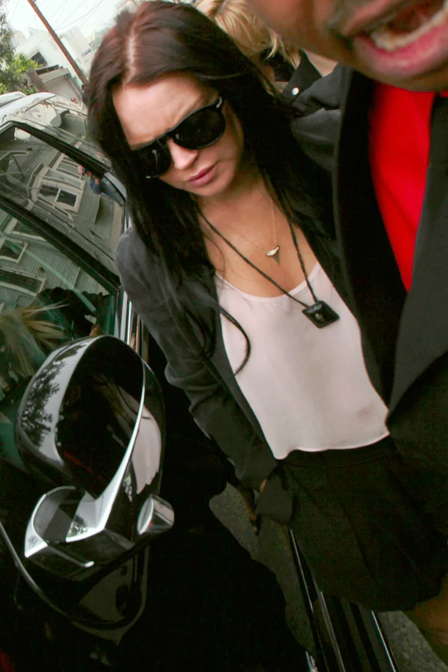 Lindsay Lohan akhirnya mau membayar kerugian atas truck yang ditabraknya ©splash