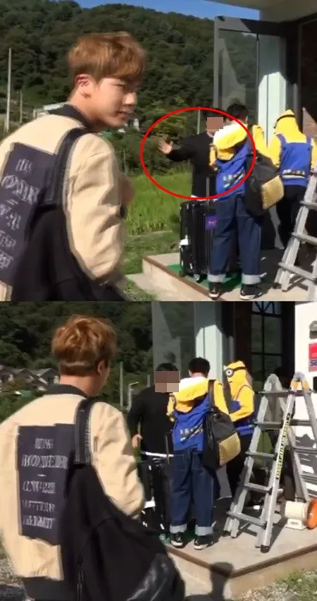Aksi manajer BTS yang diduga melakukan isyarat akan memukul member. © netizenbuzz.com
