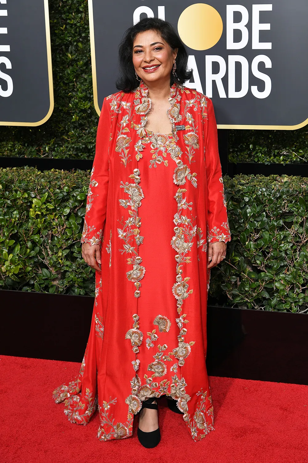 Meher Tatna mengenakan outfit merah. Credit: dailymail.co.uk