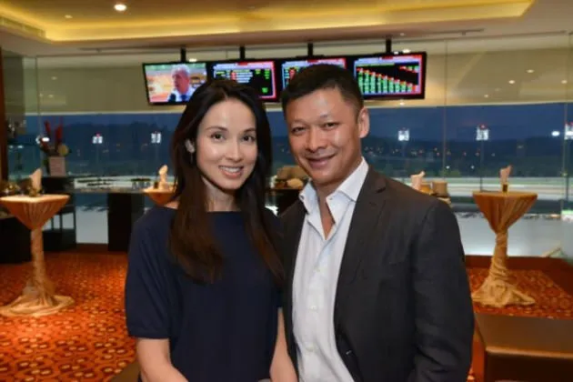 2014 lalu, Michelle Saram terlihat bersama sang suami datang ke sebuah pesta di event balap. (credit: asiaone.com)