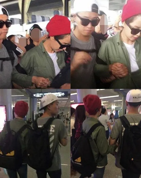 Song Ji Hyo dan Kang Gary tertangkap kamera bergandengan tangan di bandara. ©allkpop.com