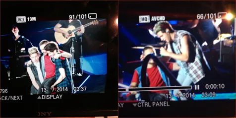 Niall dibantu oleh kedua temannya untuk berdiri/Twitter©