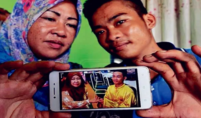 Junaidah dan Ibrohim, pasangan beda usia yang bertemu karena dikenalkan sang anak © Harian Metro