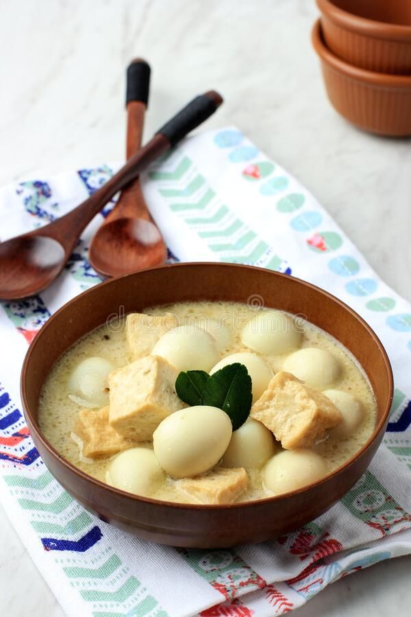 Ilustrasi Opor Telur puyuh Tahu. (foto: Pinterest/Dreamstime Stock Photos).