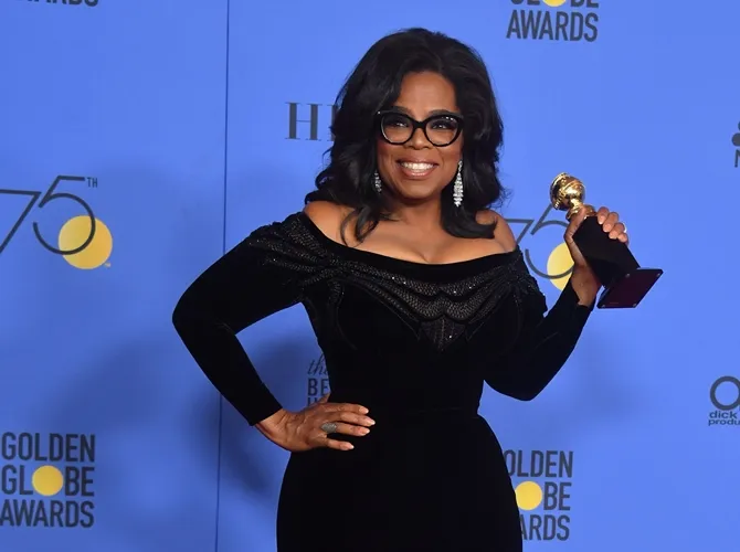 Oprah memberikan pidato yang sangat inspiratif di ajang Golden Globe 2018. © AFP