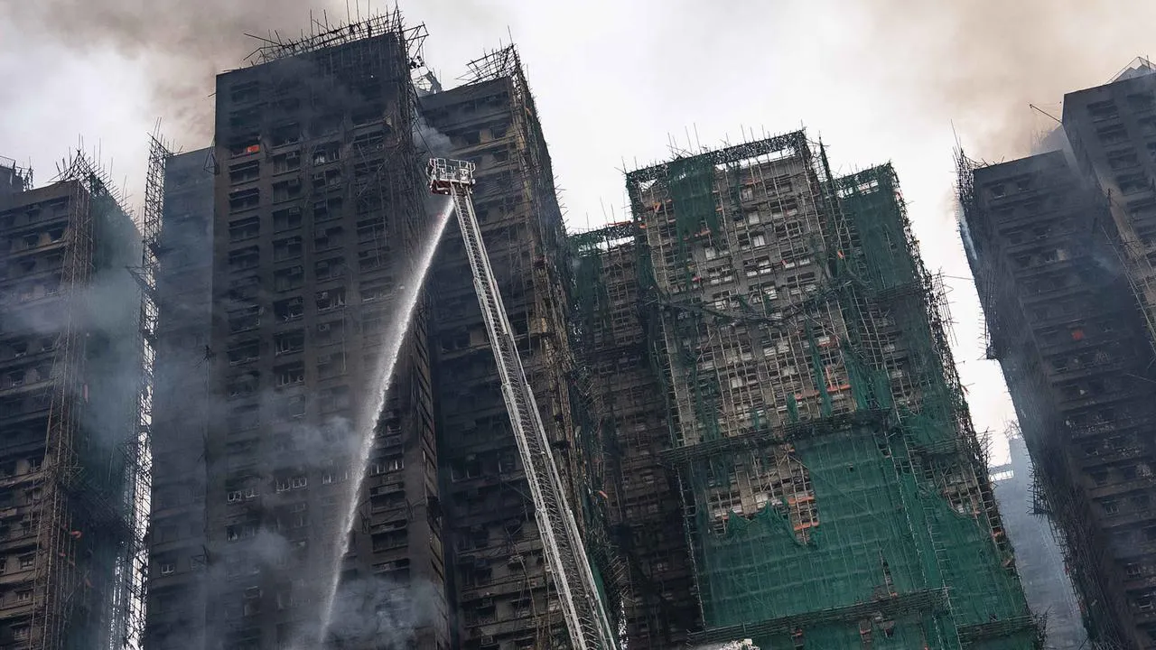 Apartemen di Wang Fuk Court Kebakaran - AP/Chan Long Hei