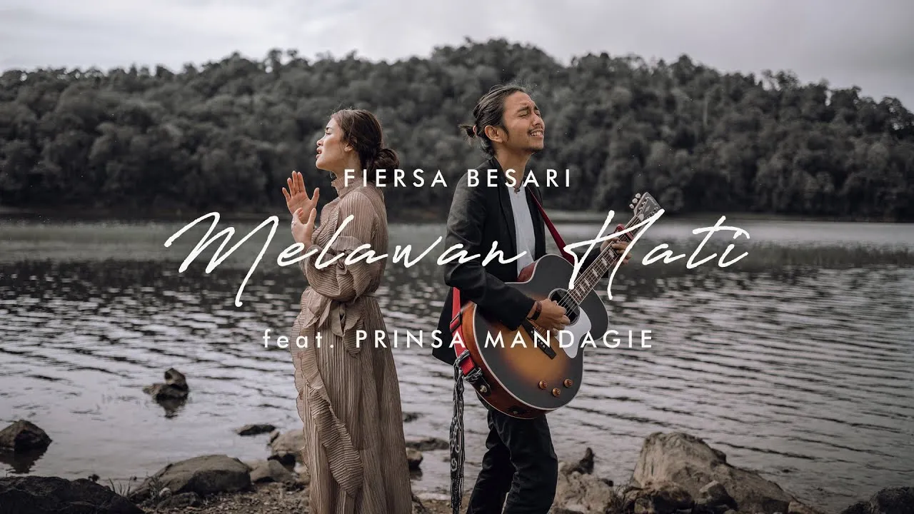 FIERSA BESARI - Melawan Hati feat. PRINSA MANDAGIE (official lyric video) (Credit: youtube.com/FiersaBesari