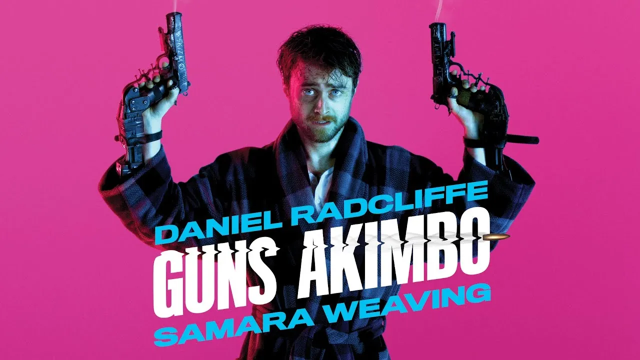 GUNS AKIMBO (Image by Youtube.com).
