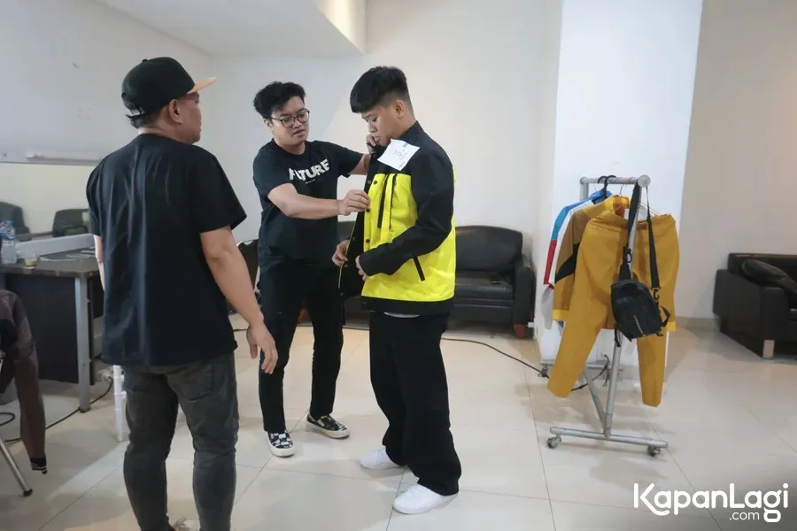 Yusuf DA pakai jaket kuning hitam © KapanLagi.com/Budy Santoso