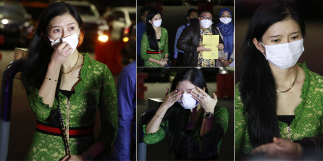 10 Portraits of Reni Effendi, Wife of Dr. Richard Lee Crying Worriedly at the Metro Police, Unaccepting of Her Husband's Forced Arrest