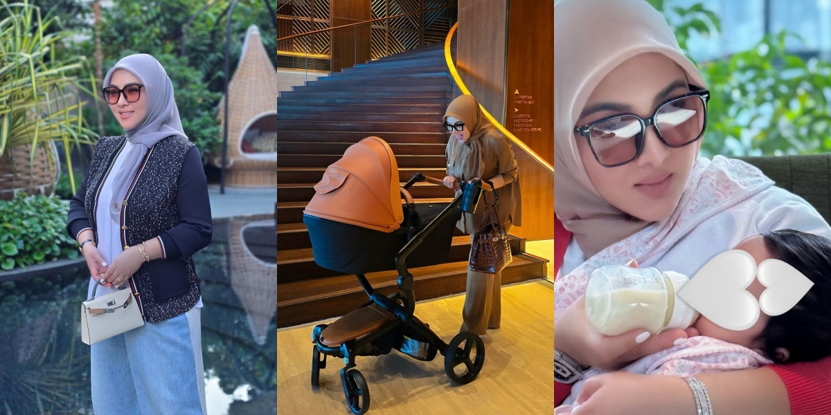 10 Photos of Syahrini's Leisurely Strolls in Singapore, Breastfeeding Baby 'R' - Pushing a Stroller While Carrying a Branded Bag