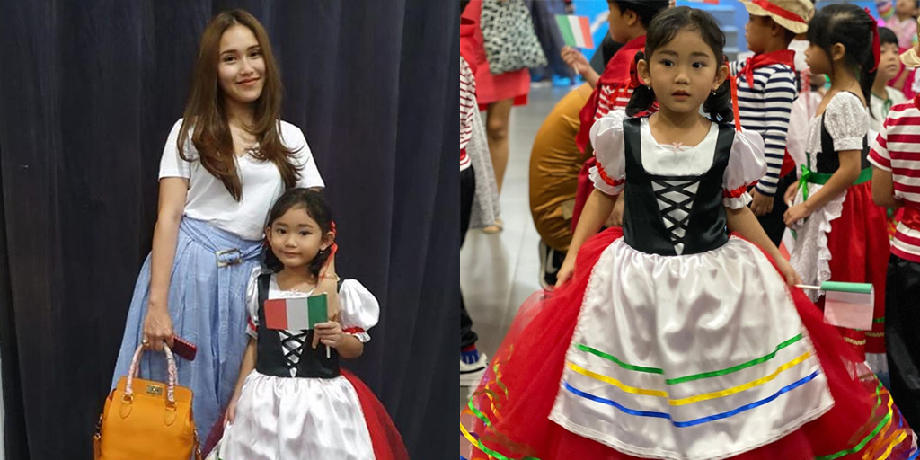 8 Beautiful and Cute Portraits of Bilqis, Ayu Ting Ting's Daughter, Wearing Traditional Italian Clothing