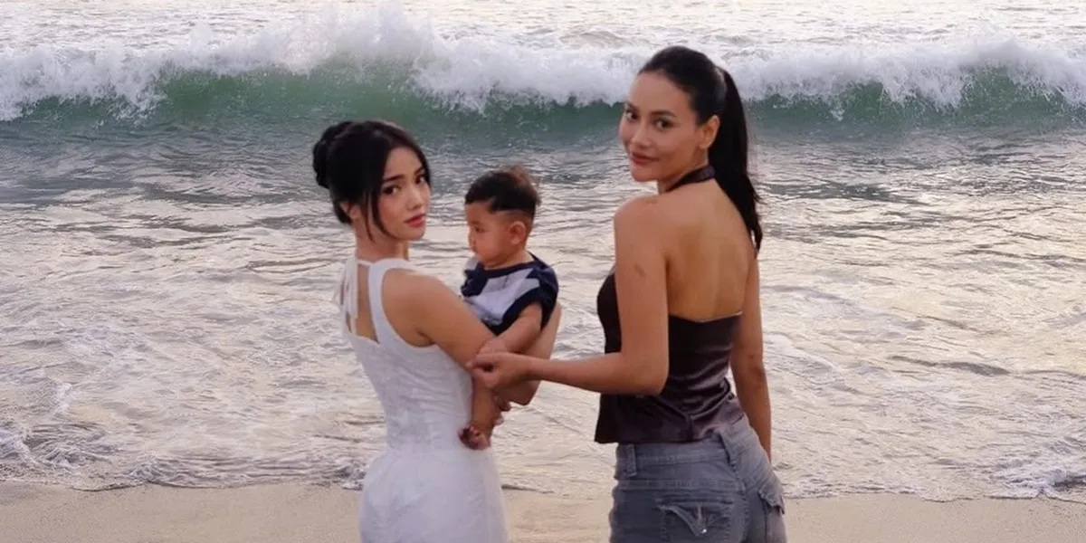 8 Portraits of Fuji Caring for Baby Andrew, Erika Carlina's Child, Calmly Being Held