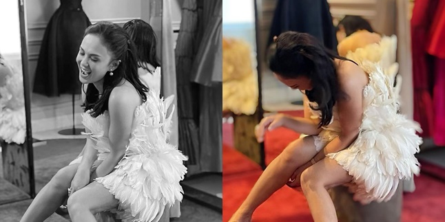 8 Pictures of Yuni Shara Beautifully Wearing a Feathered Dress, Netizens Point Out Her Wrinkled Legs